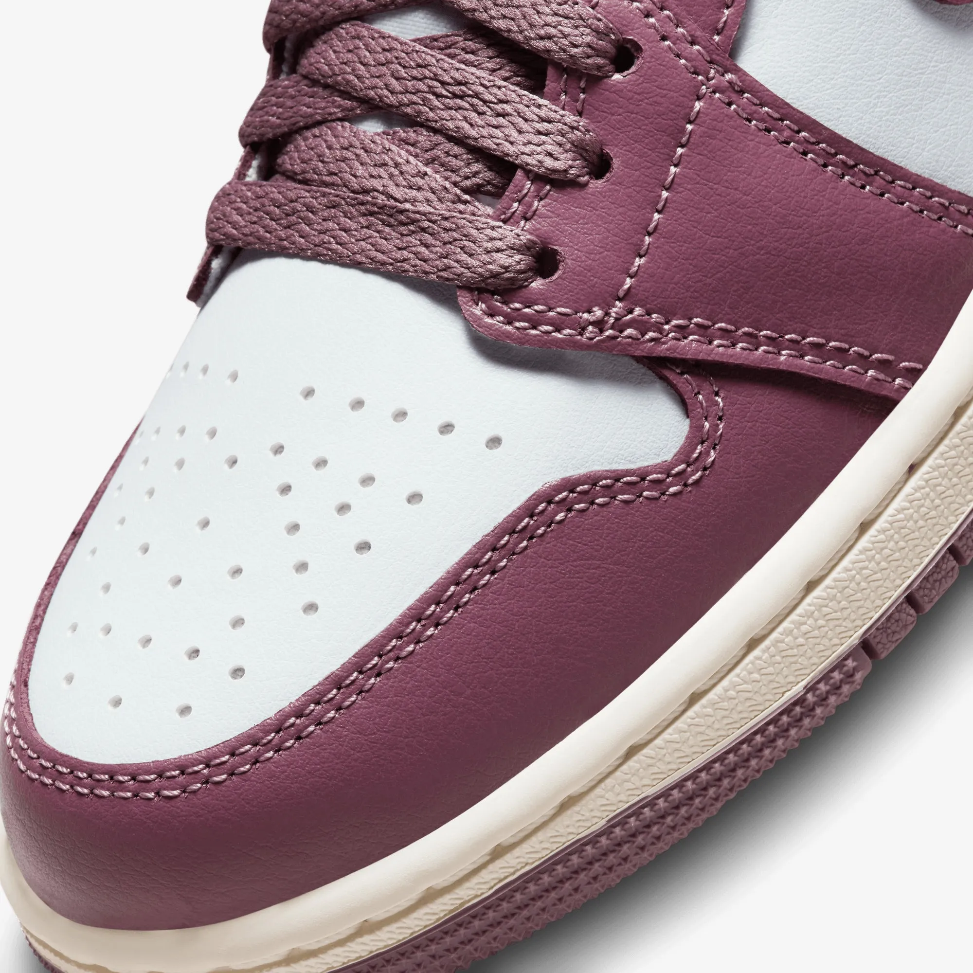 Jordan | WMN'S AIR JORDAN 1 MID  { PURE PLATINUM/SKY J MAUVE-SAIL