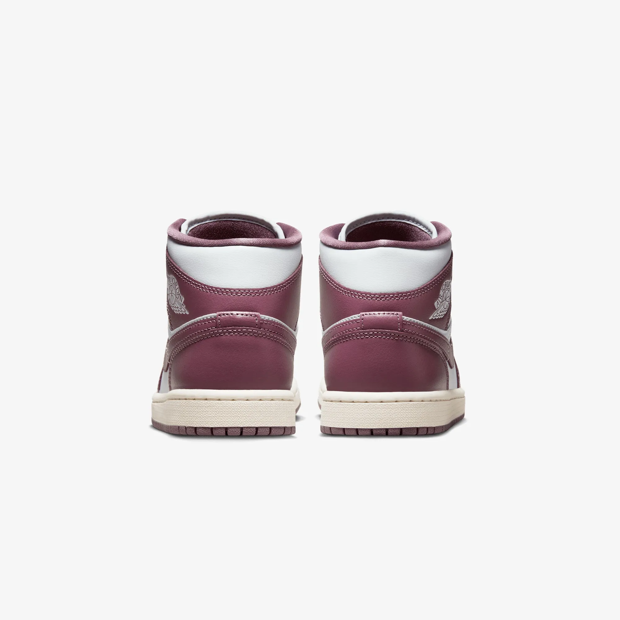 Jordan | WMN'S AIR JORDAN 1 MID  { PURE PLATINUM/SKY J MAUVE-SAIL