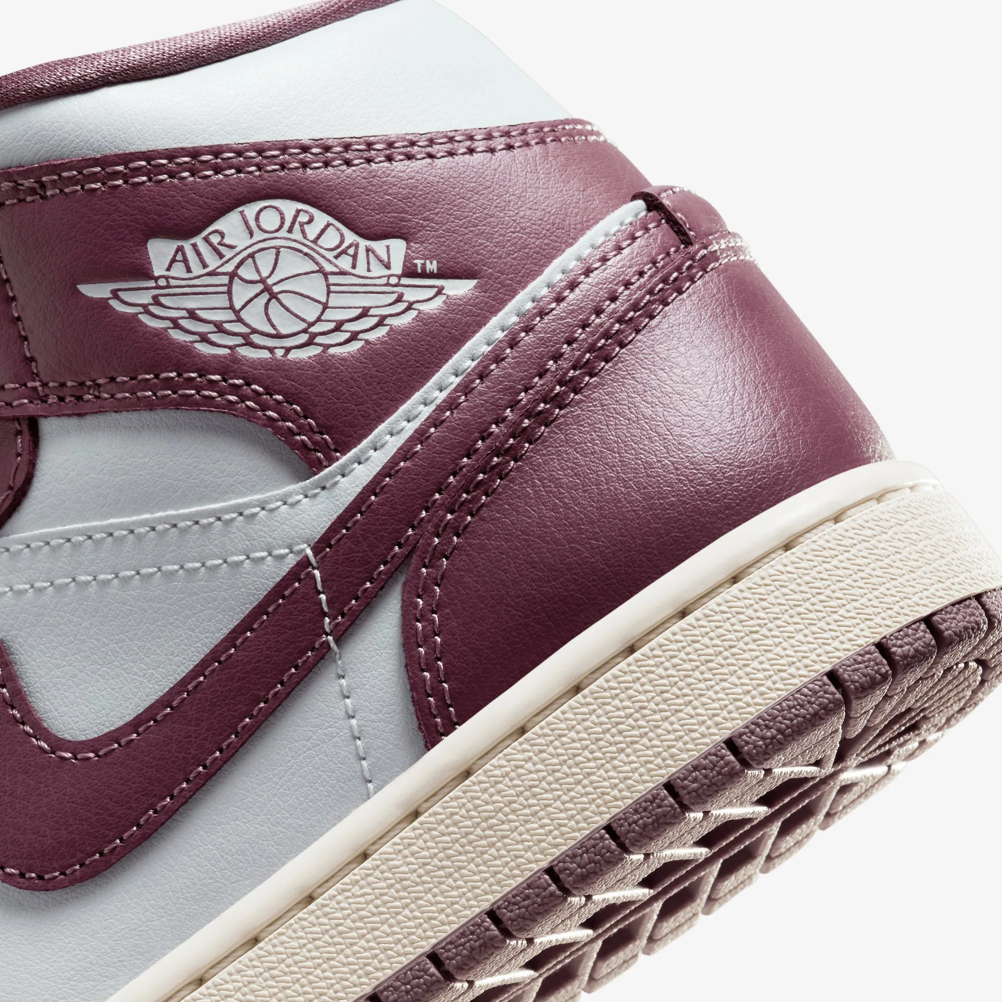 Jordan | WMN'S AIR JORDAN 1 MID  { PURE PLATINUM/SKY J MAUVE-SAIL